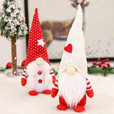 Auffällige gesichtslose Zwergenpuppe mit festlichem Ornament aus weichem Stoff