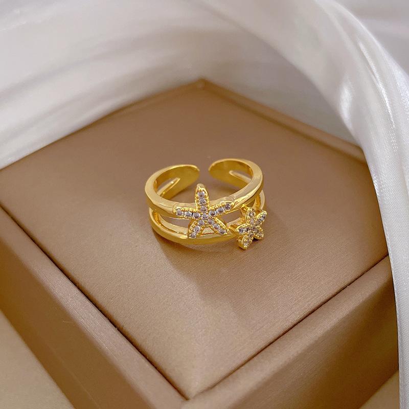 

Позолочене справжнім золотом Відкрите Морська Зірка Модне Жіноче Кільце Злегка Інкрустоване Легкий Люкс Кільце На Вказівний Палець У тому ж Холодному Стилі opening adjustable