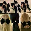 Nouvelles épingles à cheveux en velours noir avec nœud et ruban, élégantes pinces à cheveux camélia en tissu pour femmes, accessoires de coiffure tendance pour queue de cheval