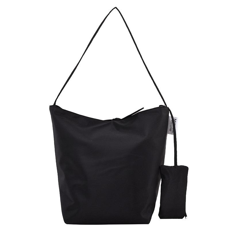 Casual large-capacity bag women's 2025 simple canvas bag versatile one-shoulder armpit bag student class bag handheld