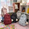 Schultasche Neue Mittel- und Oberschul-Schultasche Lässiger Bestickter Rucksack Universitätsrucksack Puppenanhänger Große Kapazität Lässige Pendlertasche