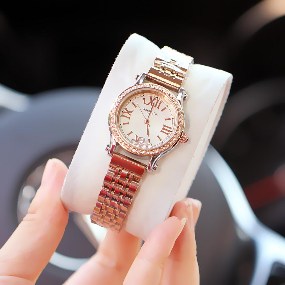 Fashion Ladies Watch Flowing Diamond Pointer Roman Steel Belt Diamond Quartz Waterproof Watch
