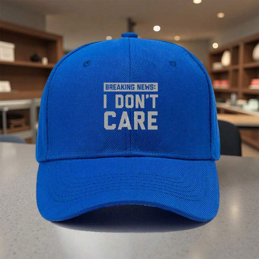 Red Adjustable Baseball Cap With Printed Breaking News: I Dont Care Text
