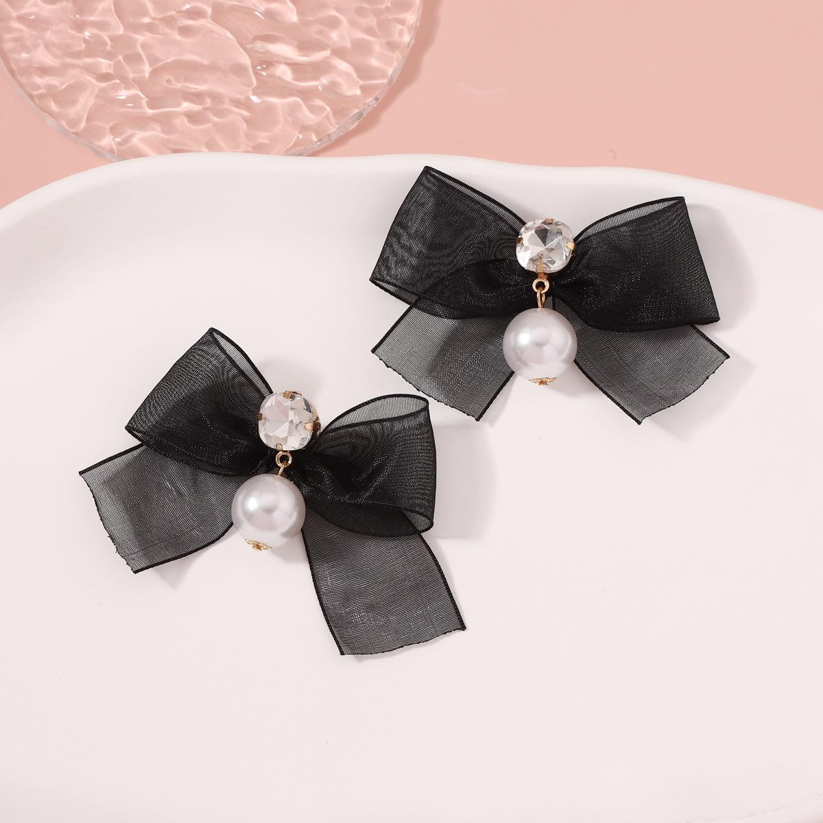 

Bow-shaped diamond-encrusted, trendy and fashionable, versatile, light luxury earrings and stud earrings for women