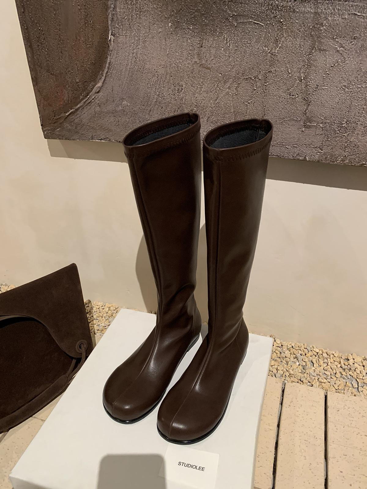 

Cowhide version~ autumn and winter new round head elastic socks boots women s thin boots flat-bottomed temperament sleeve high boots women s 40