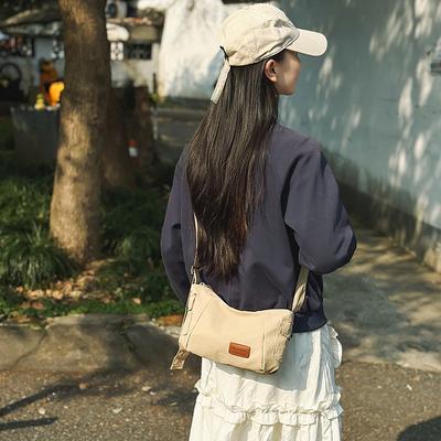 Nieuwe dames tas koppel trendy veelzijdige schoudertas casual en lichtgewicht dumpling tas outdoor sport messenger tas