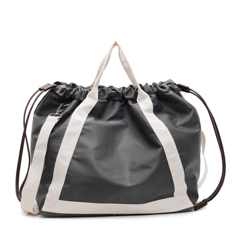 Lazy wind large-capacity bag women's spring and autumn fashion versatile handbag pumping mouth commuter bag shoulder messenger bag