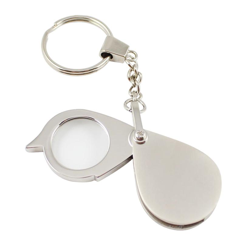 Tragbare Taschenleselupe 15X Faltbar mit Metall Schmucklupe Vergrößerungsbrille Linse Schlüsselanhänger Geschenk