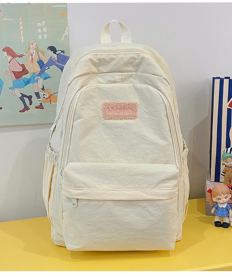 School bag 2025 new large-capacity sweet and cute college student school bag Korean version fresh and versatile backpack casual and lightweight bag