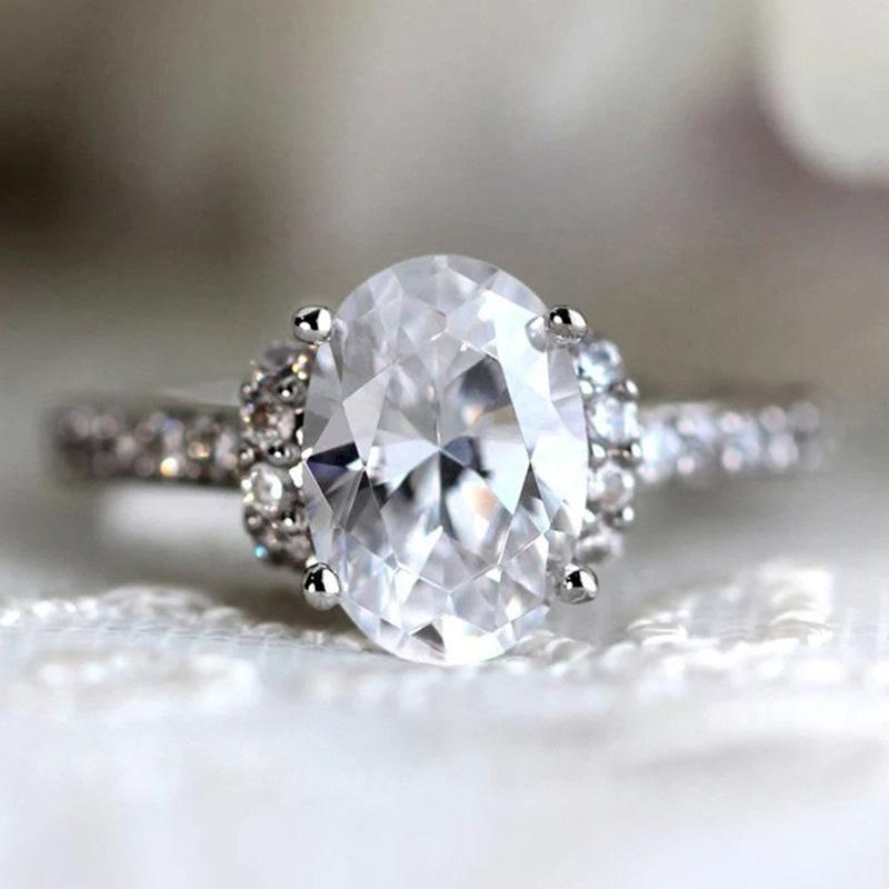 2026 Inlaid Oval Pigeon Egg Cube Zirconia Ring, Fashionable and Personalized Platinum Engagement High-quality Jewelry
