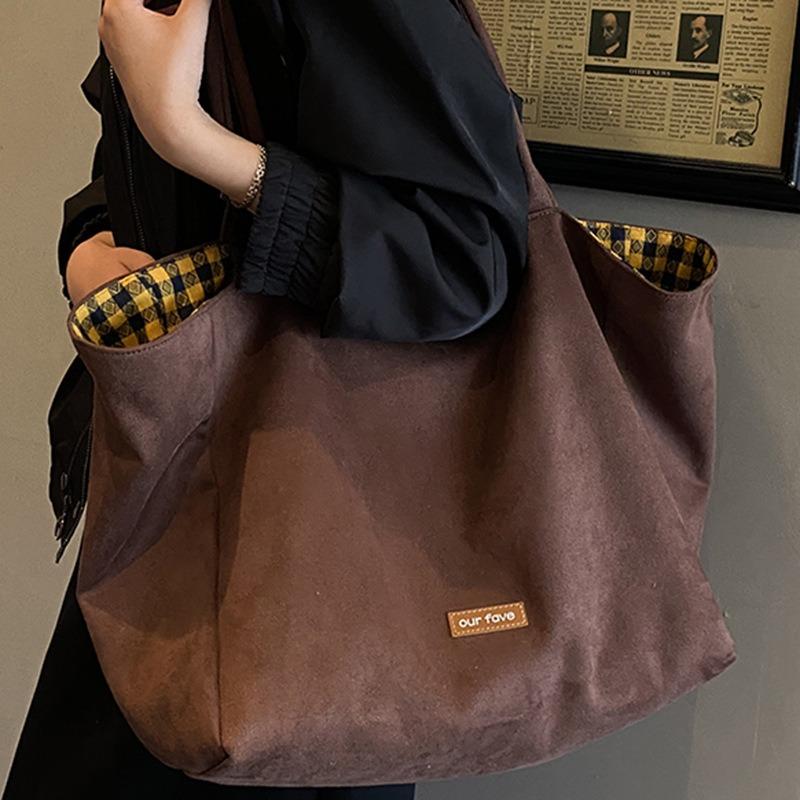 Autumn new niche leopard print canvas bag women's large capacity reversible shoulder bag simple casual commuter bag for work
