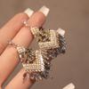 Crystal rhombus fringed stud earrings Bohemian ethnic style earrings Light luxury high-end temperament earrings