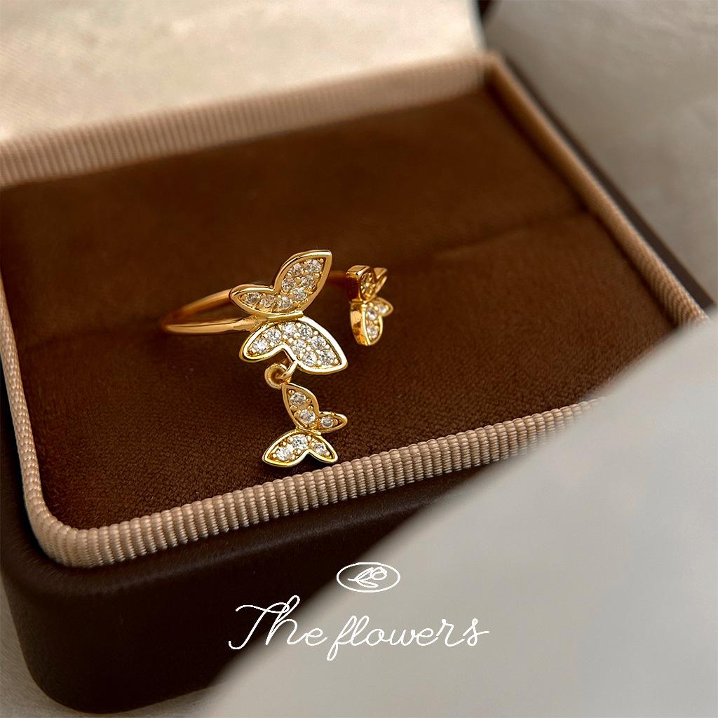 Micro-inlaid zircon-plated real gold, high color retention butterfly ring, adjustable opening, elegant ring.