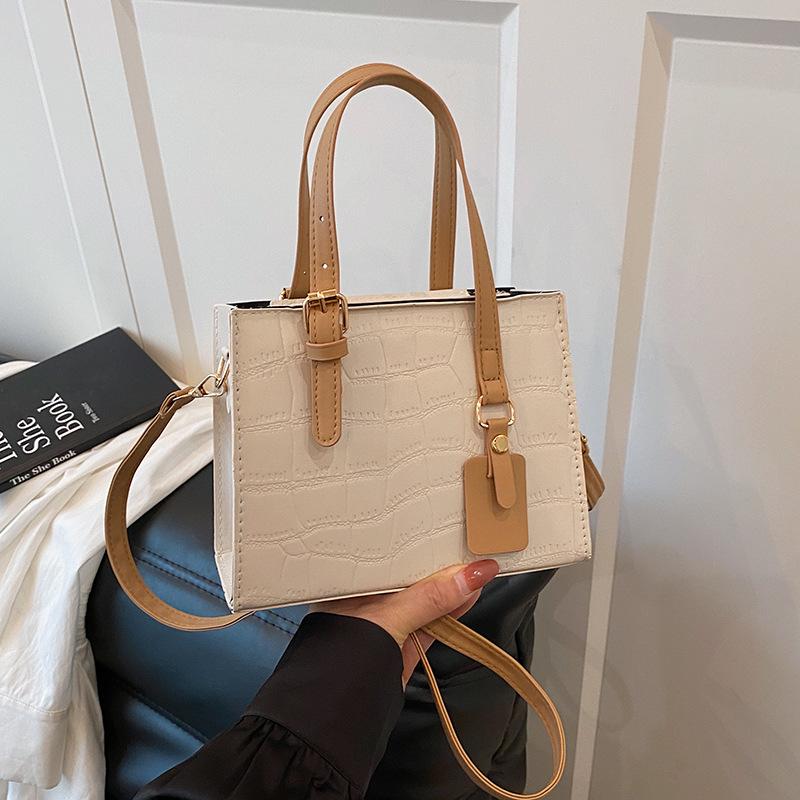 Leather niche temperament bag women's 2025 new light luxury messenger bag high-end portable tote bag