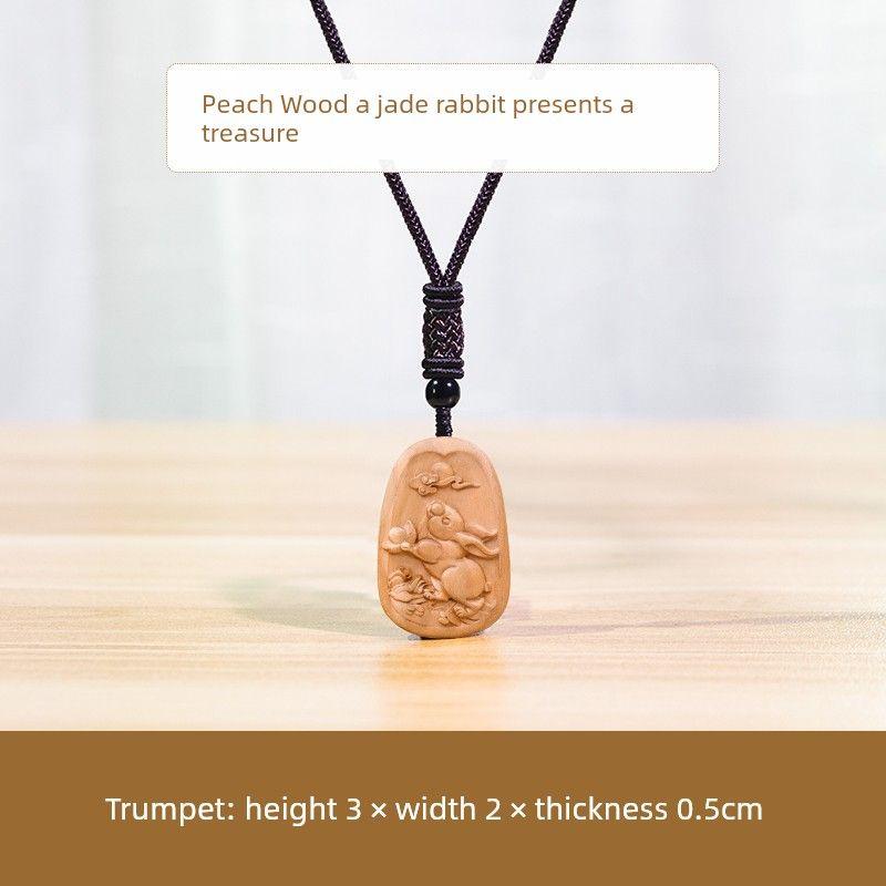 

Знак китайского зодиака, носящий деревянный кулон-талисман в виде кролика Jade Rabbit Treasure (Peach Wood | Small size)