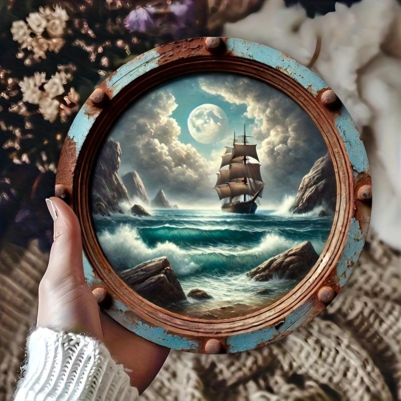 Vintage Nautical Wall Art in a Flat D Design Featuring an Aluminum Round Decor Piece Depicting a Ship And Ocean Scene It Has