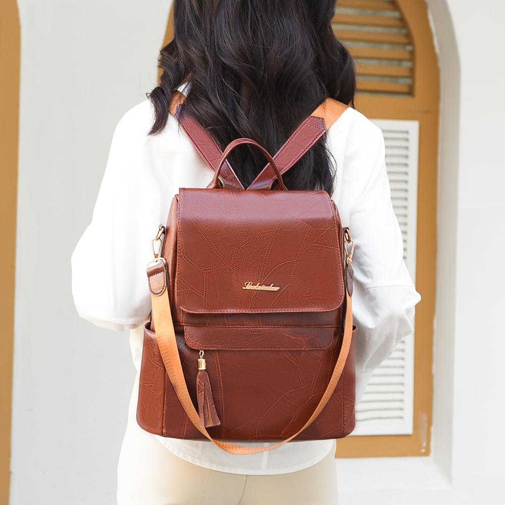 Женский многофункциональный рюкзак из мягкой кожи с кисточками в стиле ретро — фото 7