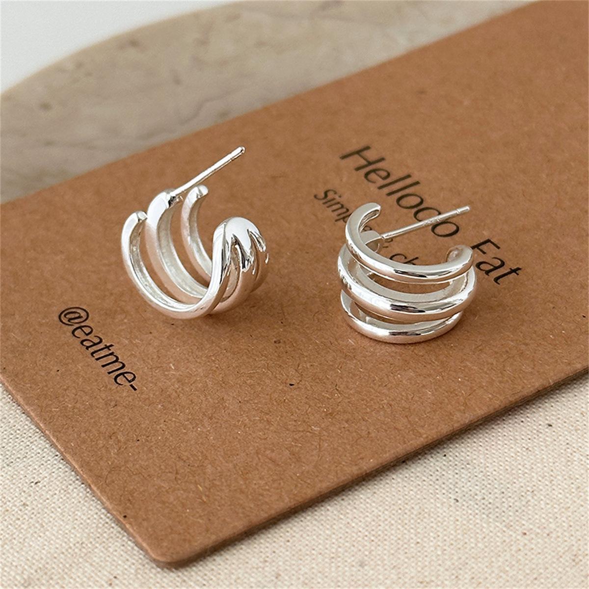 

Серебряные игольчатые трехслойные простые серьги-кольца, женский нишевый дизайн, высококачественный темперамент, холодные серьги, новые модные летние волосы silver needle