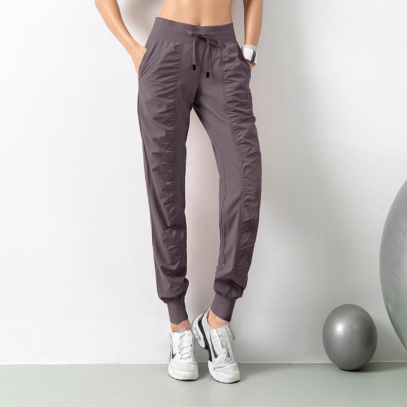 Women's Quick-Dry Athletic Joggers with Drawstring Waist and Side Pockets - Slim Fit, Breathable Polyester Blend for Running & Training