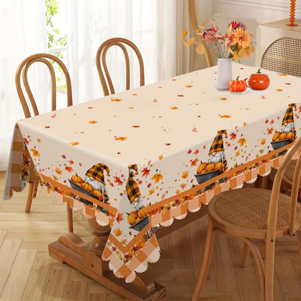 1 piece of Thanksgiving harvest tablecloth, with little dwarfs pushing a cart full of pumpkins and scattered itemszyc