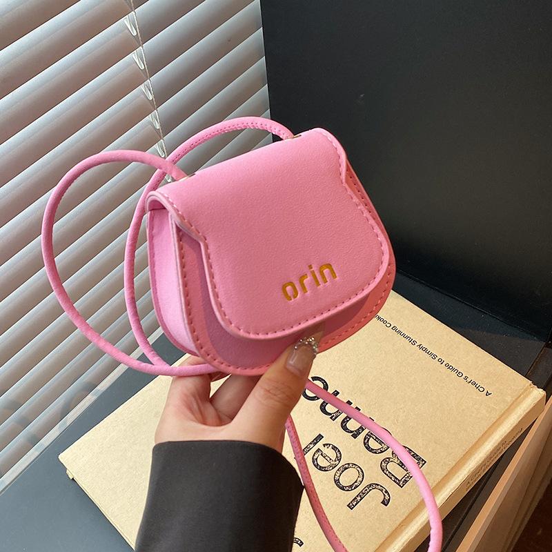 

Niche design mini saddle small bag women s new versatile fashion single shoulder messenger bag mouth red envelope розовый