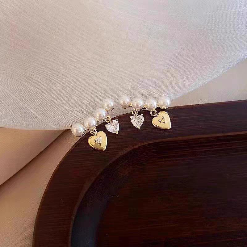 

Tassel Love Pearl Earrings, Sweet Temperament Zircon Stud Earrings, Niche Light Luxury High-End Earrings.