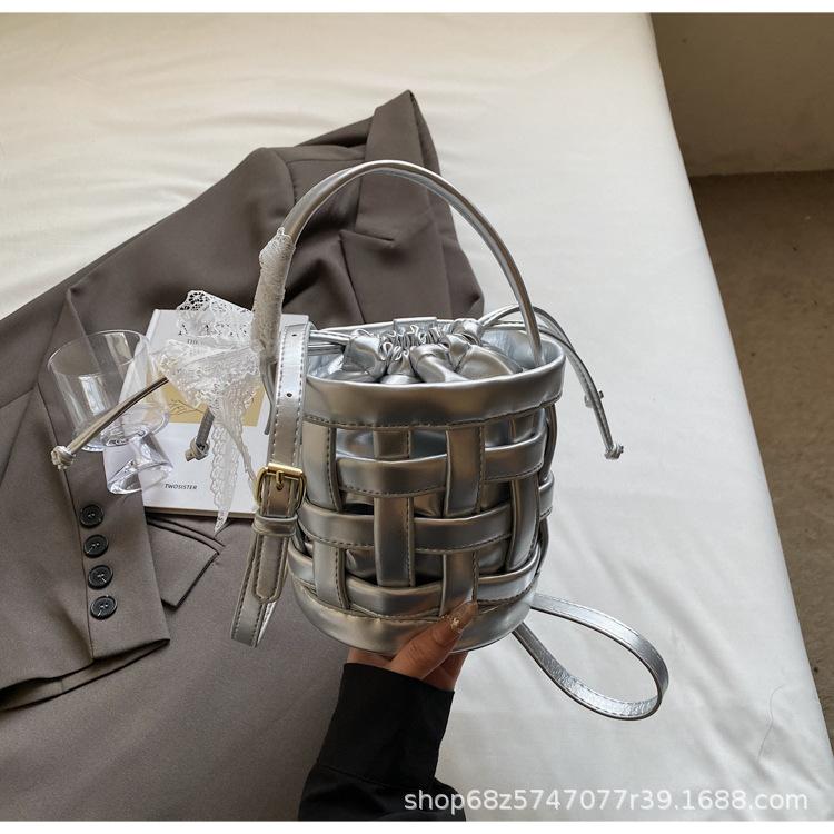 2025 Spring and Summer New Woven Niche Hand Basket Fashionable Versatile Single Shoulder Crossbody Premium Sense Commuter Bucket Bag