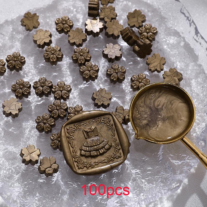 100pcs Cherry Blossom Flame Sealer Wax Grain, Flower Flame Sealer Sealer Wax Polarized Gold Sealer Wax for DIY Envelope Greeting