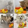 A Yellow Duck-Shaped Interactive Puzzle Toy for Cats And Dogs That Dispenses Treats, Without Battery