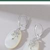 Exquisite Mother-of-Pearl Sterling Silver Luxury Earrings with Unique Face-Inspired Design