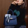 Couro genuíno, bolsa feminina livre para mães, nova bolsa de mão média de alta qualidade, bolsa feminina versátil de grande capacidade para usar a tiracolo