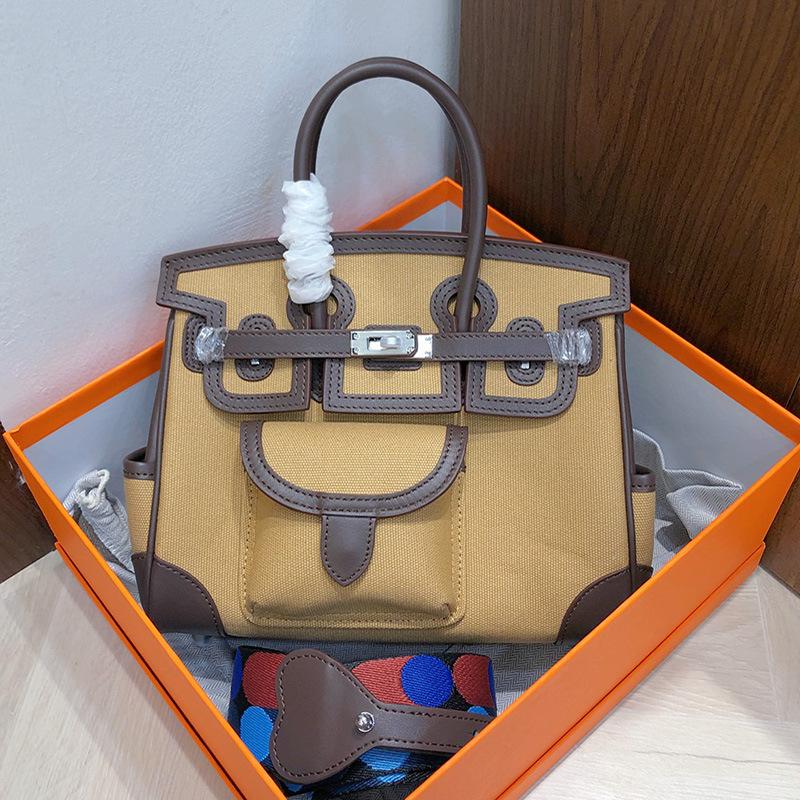 Haute couture version 2025 new cargo platinum bag canvas splicing leather women's handbag shoulder messenger bag