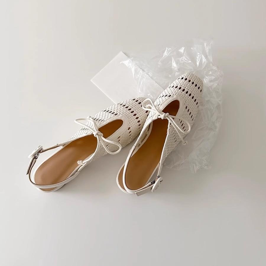 French hollow woven one-word button square head Roman sandals women's 2025 new bow thick heel holiday sandals