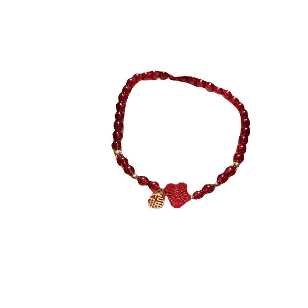 Here's a small red flower for you: a hand-woven bracelet made of cinnabar red garnet, the same style as the one featured on Little Red Book