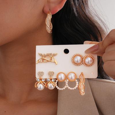 Ten-piece Set of Diamond-set Imitation Pearl Round Love Silver Needle Earrings and Earrings.