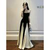French high-end black and white splicing suspender dress Hepburn style beautiful unique temperament waist a word long dress summer