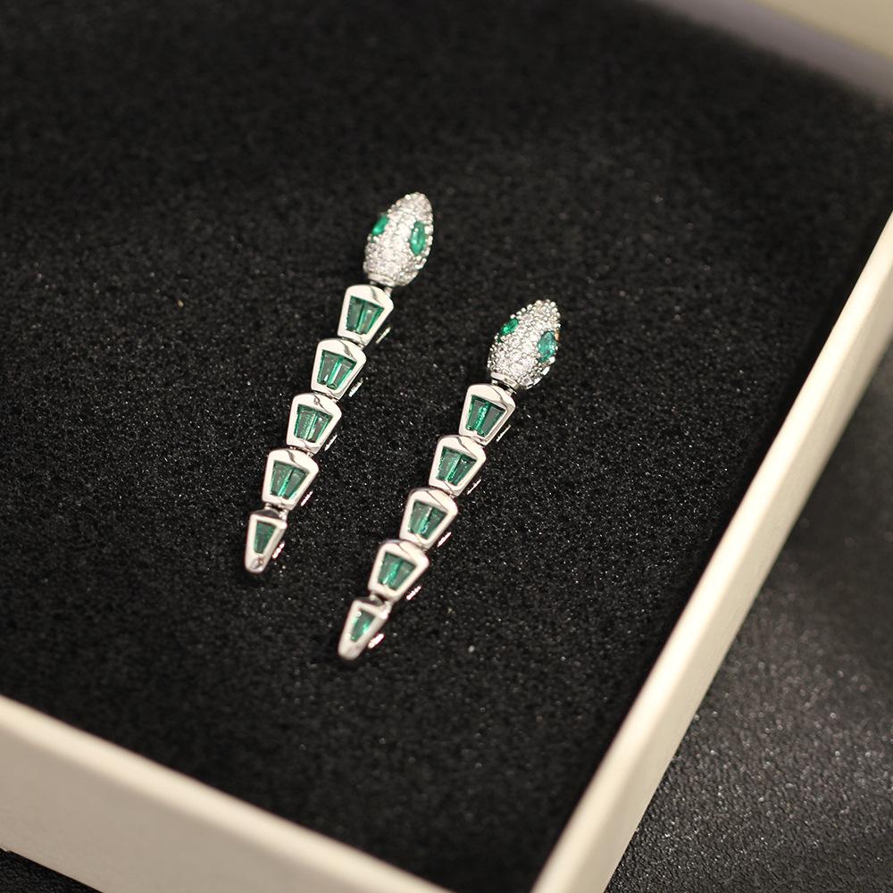 European and American niche stone inlaid green snake earrings temperament versatile fashion gold-plated silver needle earrings stud earrings women's