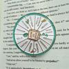What To Read Wheel Brooch Pin Rotatable Spinning Wheel Enamel Lapel Pin Aesthetic Arts Badge Gift for Kids Teens Women And Men