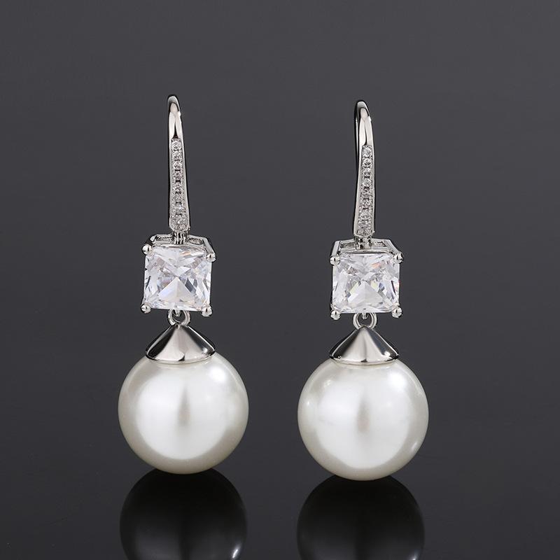 

Ювелирные изделия Медное основание Позолоченные Жемчужные серьги Серьги-гвоздики Женские 14 мм