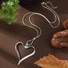 New hollow exaggerated love long necklace, women's hollow heart-shaped versatile long pendant
