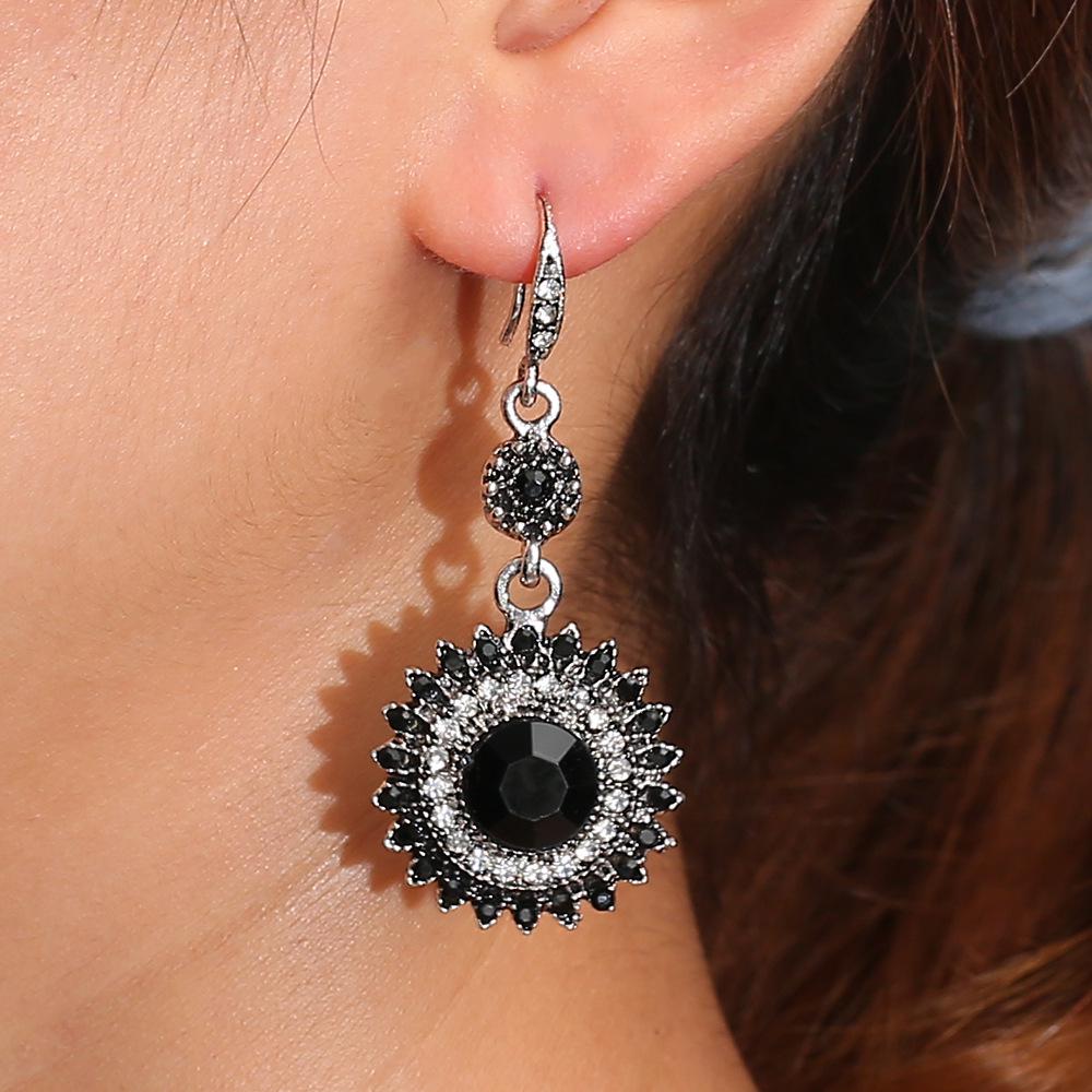 

Европейская и американская мода серьги с рубинами в виде подсолнуха