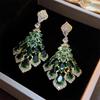 Silver Needle Cubic Zirconia Feather Dangle Earrings - Retro High-End Style, Niche Exaggerated Design for Women.