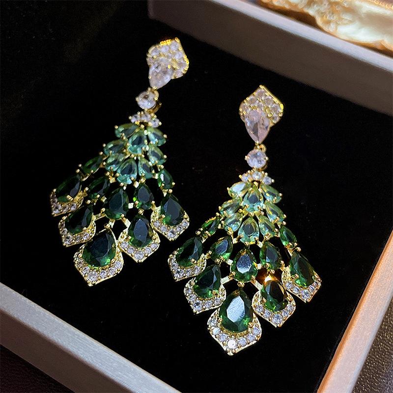 Silver Needle Cubic Zirconia Feather Dangle Earrings - Retro High-End Style, Niche Exaggerated Design for Women.