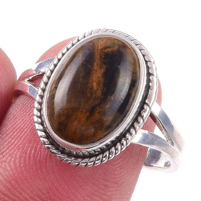 

Кольцо из чистого серебра 925 пробы с натуральным камнем Питерсит, размер 9 O8P98