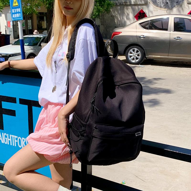 New junior high school primary school students schoolbag large capacity lightweight backpack girl simple leisure travel backpack tide