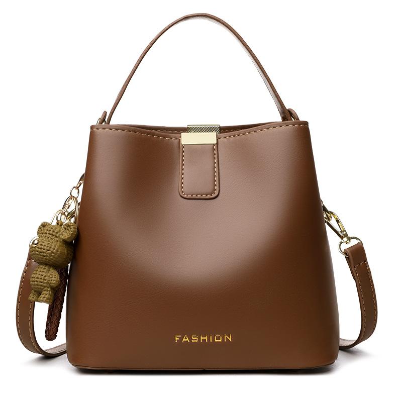 

Texture popular small bag women s new trendy fashion autumn portable bucket bag feeling simple shoulder messenger bag коричневый