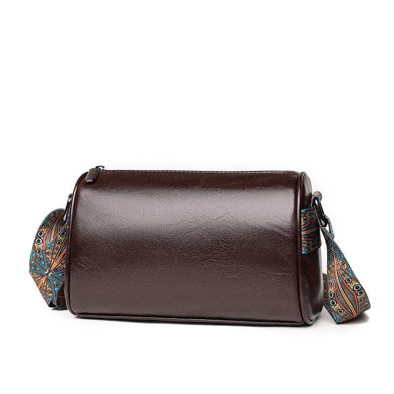 

Ретро однотонная женская сумка 2025 новая широкая плечевая лямка сумка-цилиндр персонализированная модная плечевая сумка женская