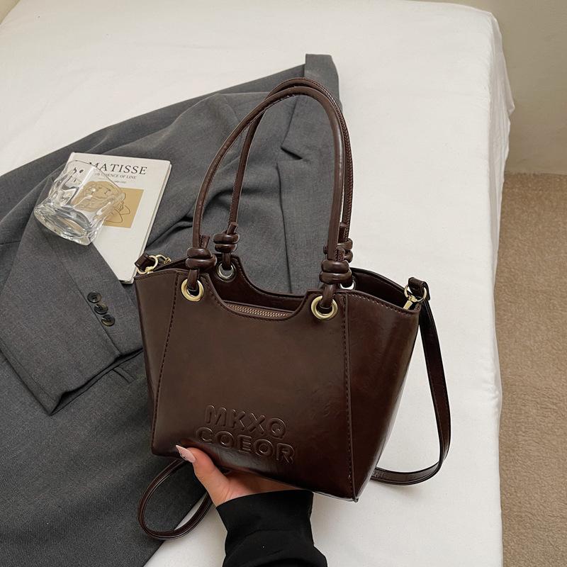 

Retro simple portable bucket bag autumn and winter new fashion simple shoulder bag niche messenger bag women