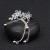 White Gold Exquisite Flower And Leaf Tassel Earrings With Cz Stone Embellishment