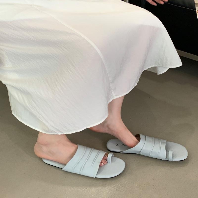 Spring and summer women's outer wear Roman women's shoes one-word seaside beach sandals design sense niche flat-bottomed pinch slippers